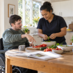Support worker helping prepare a meal at home